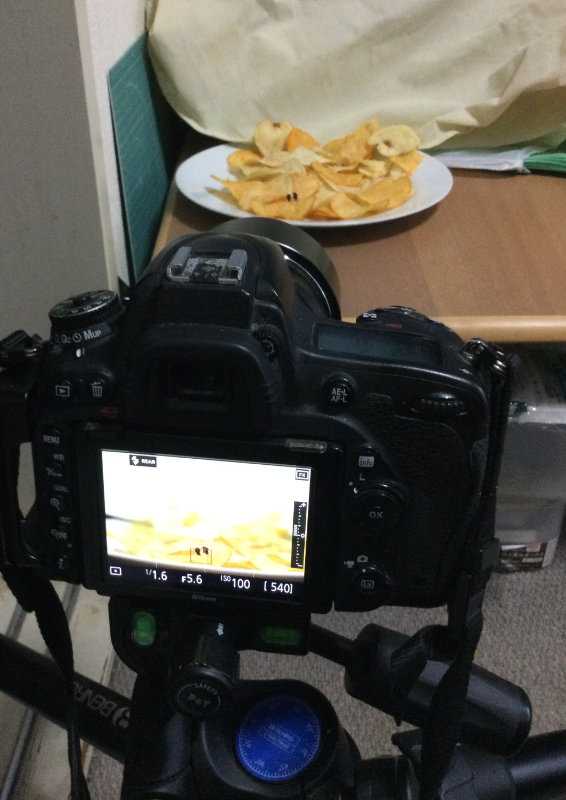 Setting up a plate of potato chips to resemble sand dunes